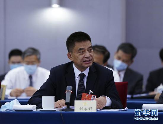  5月23日，全國政協(xié)委員劉永好在政協(xié)聯(lián)組會上發(fā)言。新華社記者 謝環(huán)馳 攝